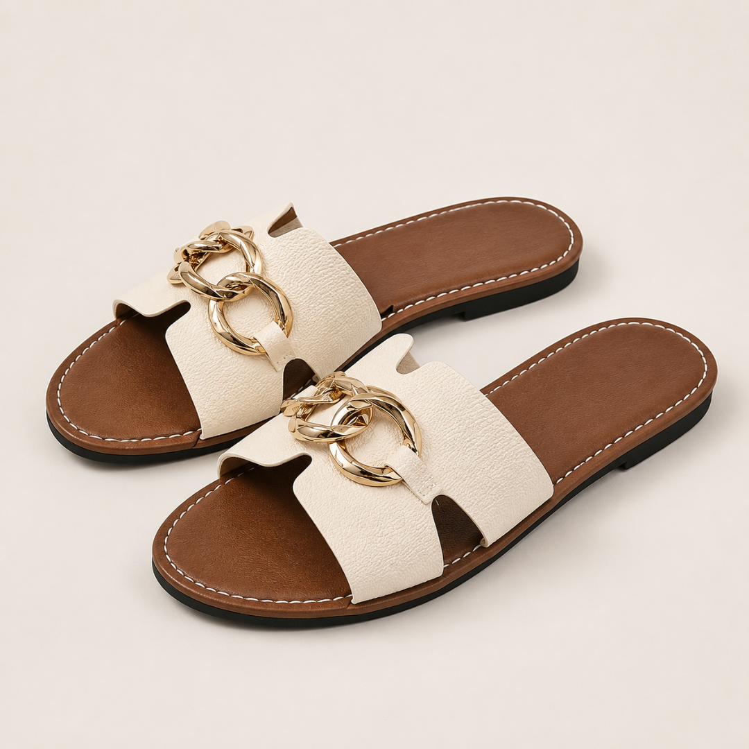 Sandalias planas con cadena dorada®