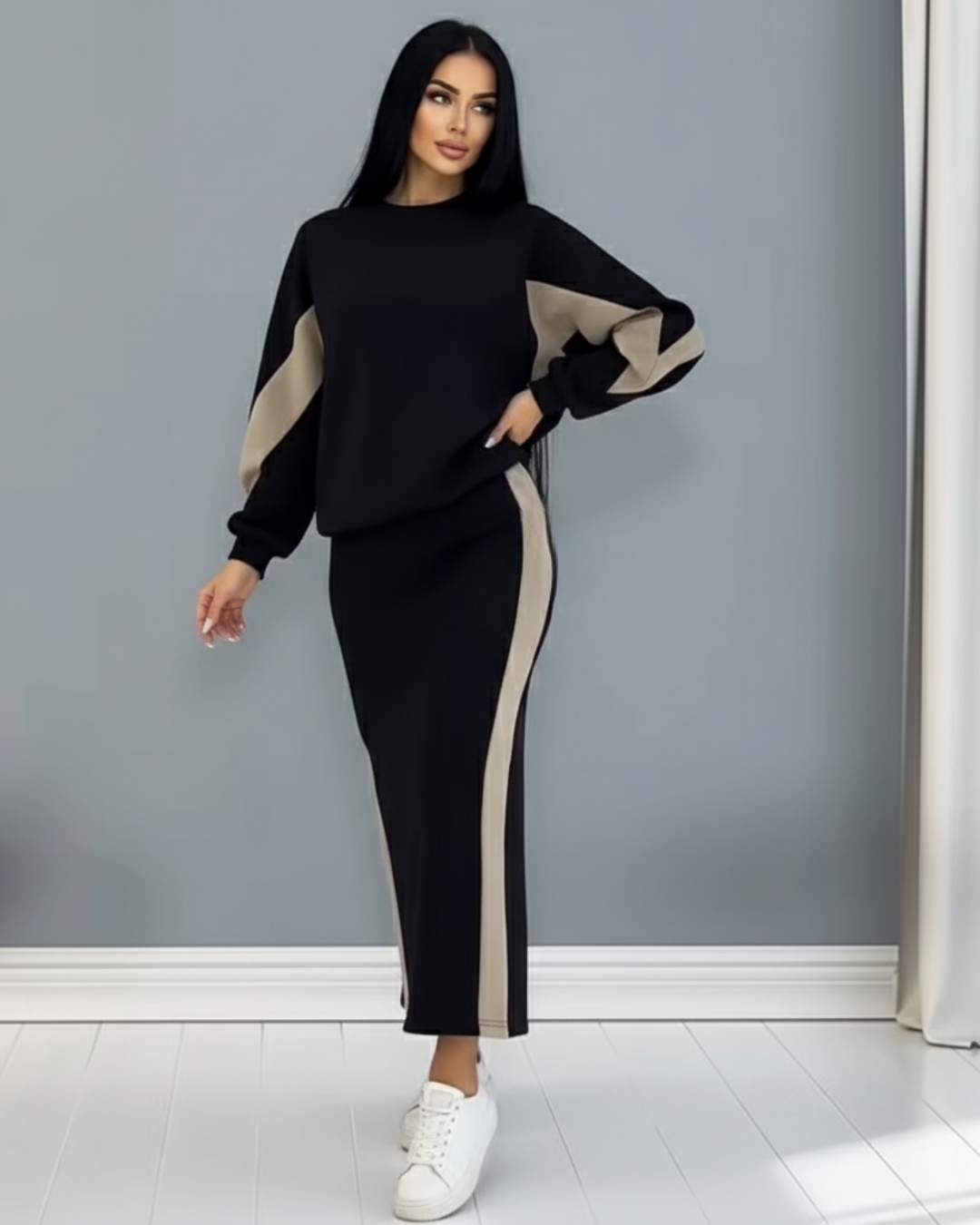 Conjunto holgado con top de manga larga y falda con abertura