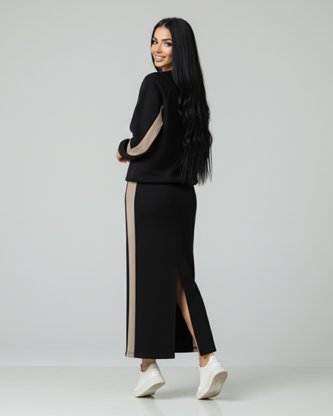 Conjunto holgado con top de manga larga y falda con abertura