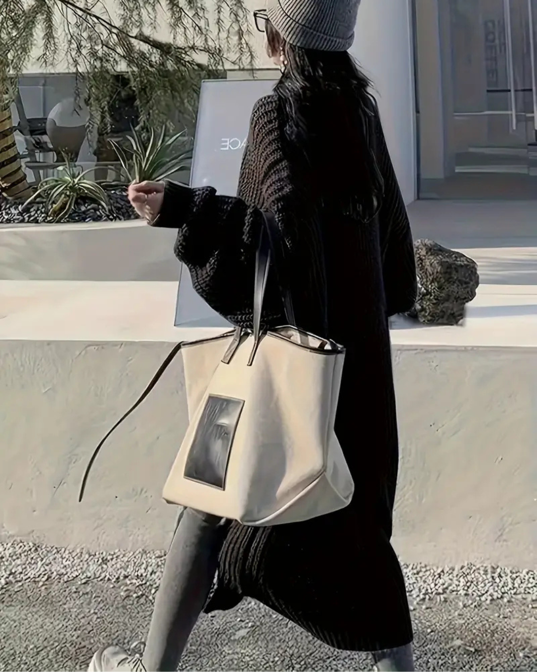 Abrigo largo para mujer con estilo abierto y bolsillos frontales